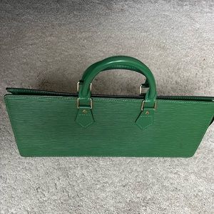 Louis Vuitton sac Triangle leather handbag